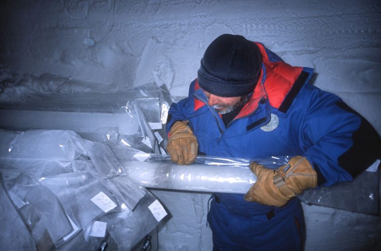 Ancient Air in Ice Cores Extends the Climate Record A scientist examining a drilled ice core sample
