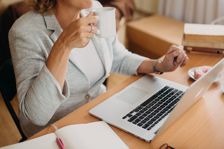 The Psychology Behind Productive Morning Routines Morning desk with journal in early sunlight